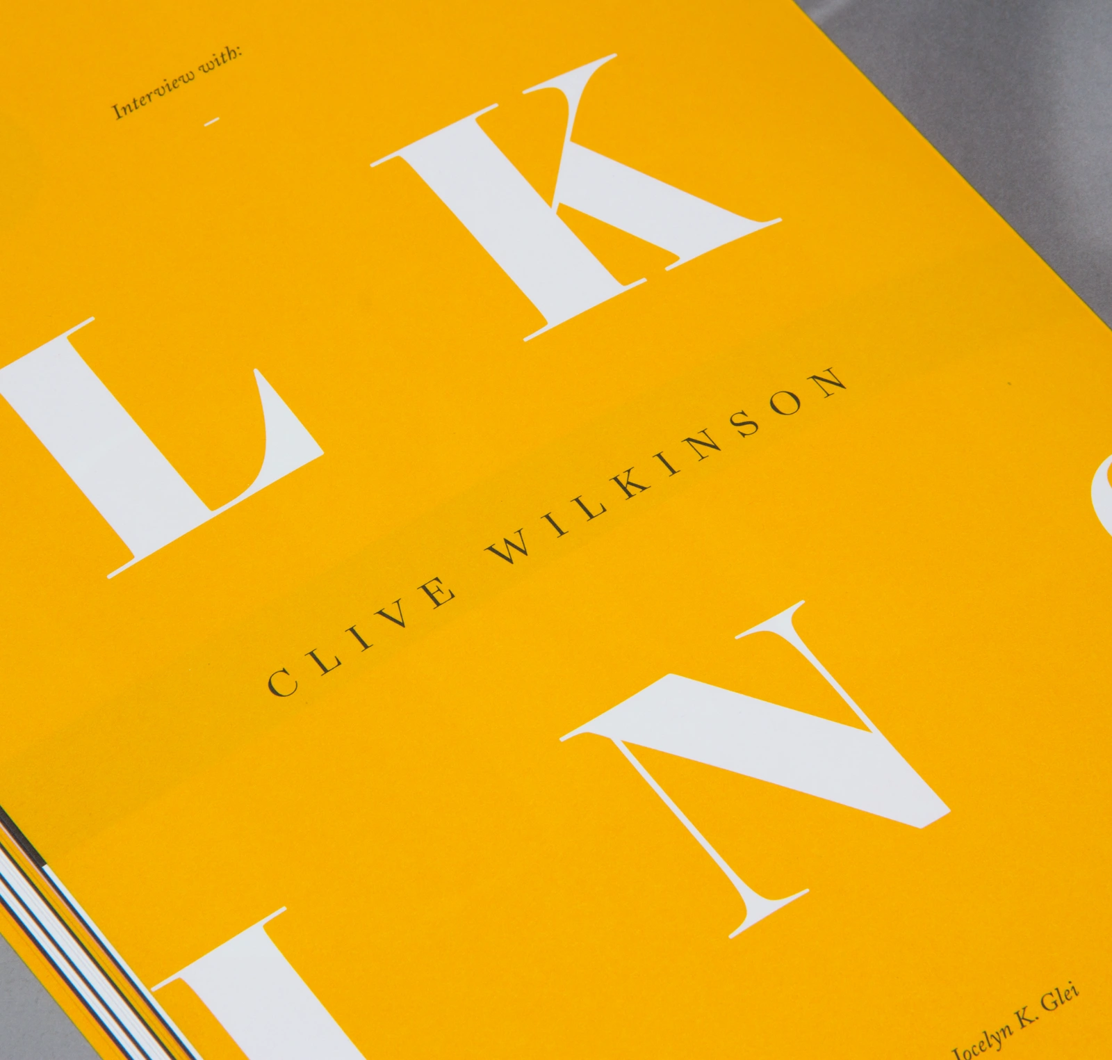 Yellow 99U Quarterly editorial spread with large white serif lettering